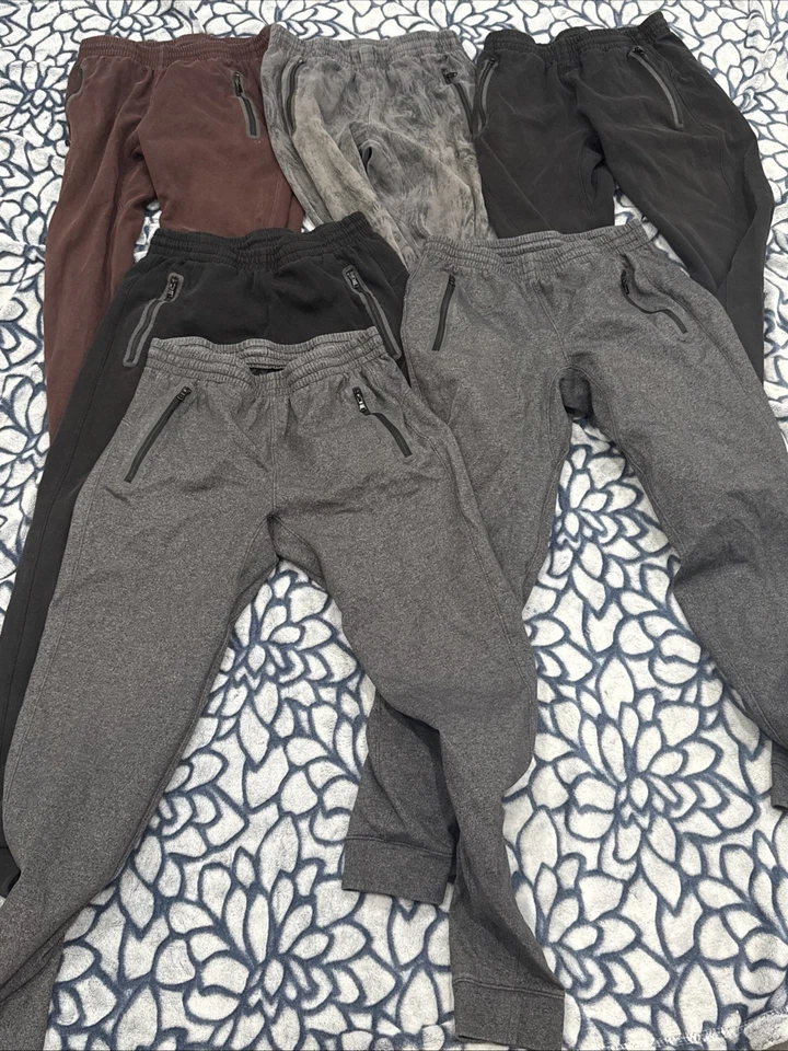 Pantalones deportivos para hombre talla 6 pequeños Old Navy con cordón y bolsillos con cremallera Foto 2 de 4