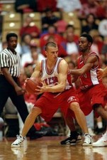 Fresno State Bulldogs guard Chris Herren looks to pass the ball as- Old Photo