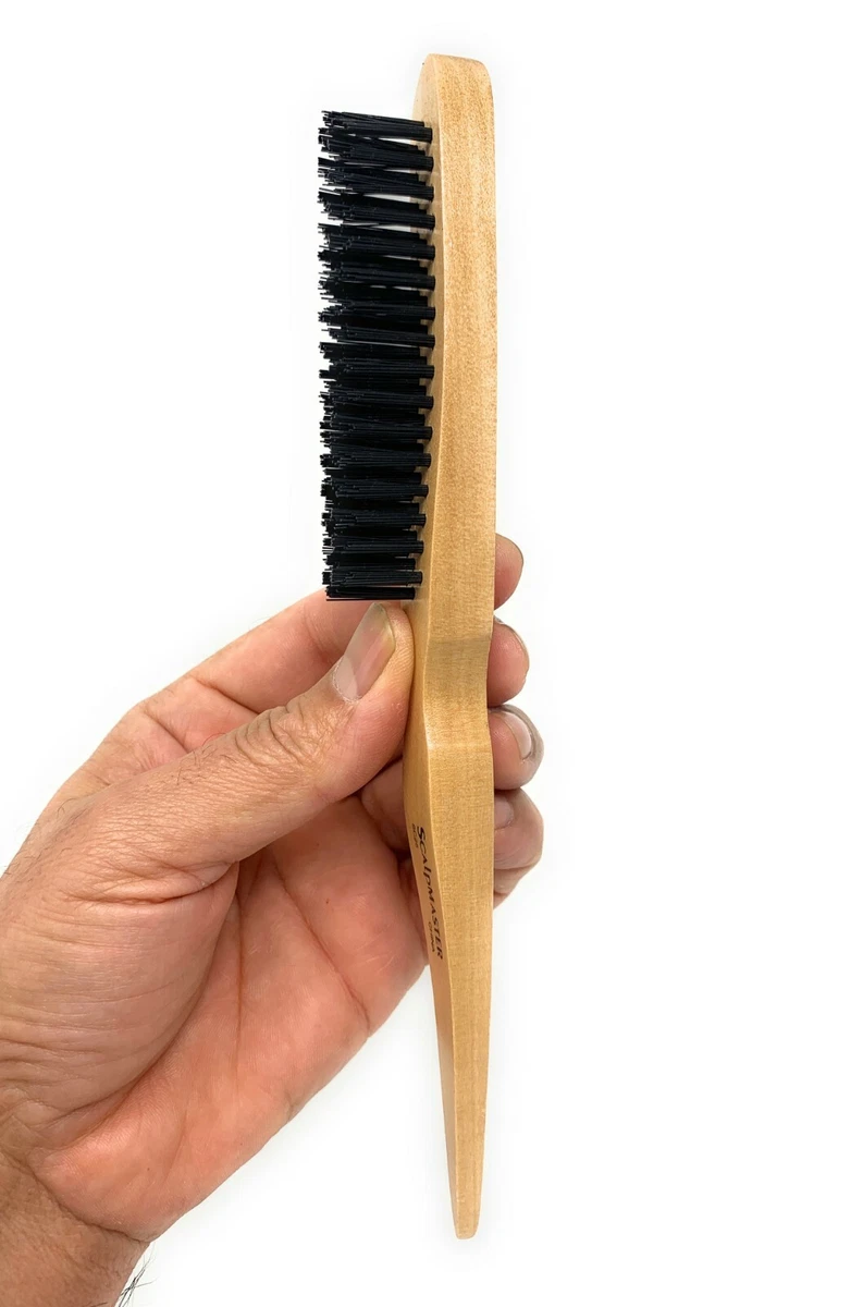 Teasing brush outlet