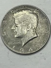 One 1969 D Mint Mark Kennedy Half Dollar . 40 Percent Silver