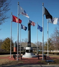 Photo:war memorial Niles, Michigan, that features flags all five U.S. arme