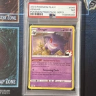 PSA 7- Gengar 066/196 Prize Pack Series: 3 Pokémon Play! Graded Card