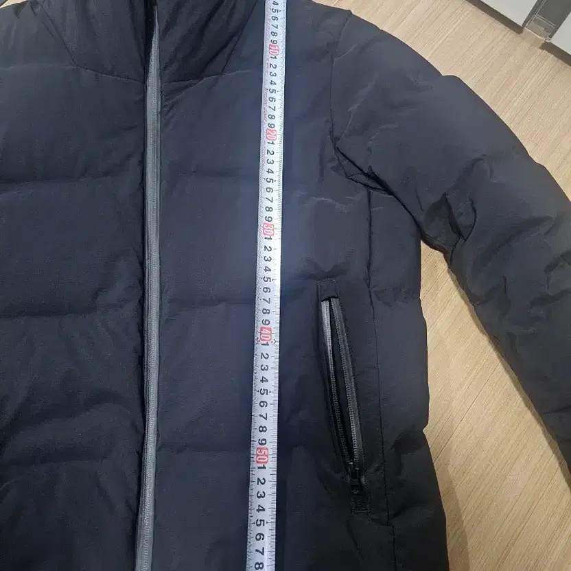Uniqlo Black Seamless Puffer Jacket Men's S thumbnail 6