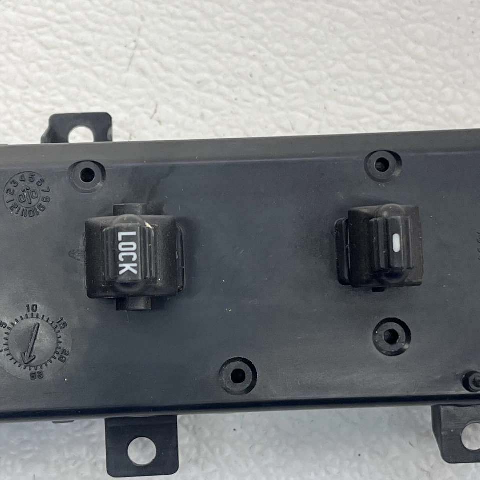 Jeep Grand Cherokee WJ 1999-2004 OEM Interruptor de bloqueo de ventana eléctrica lateral del pasajero OEM Foto 4 de 4