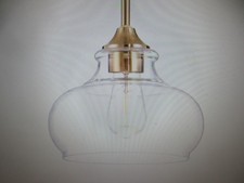 Kira Home Harlow 60W 1-Light Cool Brass Modern Pendant Light with Clear Shade