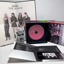 Blackpink The Album Unsealed with Photocards, photobook, poster, and CD.
