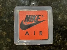 Nike Air Jordan Orange Shoe Hang Tag from  the 90s 