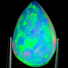 7.02 Ct IGI Certified Natural Ethiopian Cabochon Opal Multi Color Pear Cut — photo 5