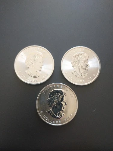 3 Canadian Silver Maple Leaf bullion coins, each containing 1 troy ounce of fine