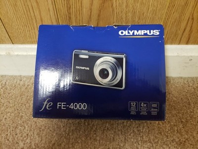Olympus FE-4000 12.0MP Digital Camera w/ Battery Parts Only