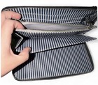 Authentic Louis Vuitton Rare Damier Graphite Trunks and Locks Wallet Unisex — photo 6