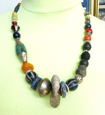 Ethnic tribal necklace, fossil ammonite focal, Tibetan silver capped