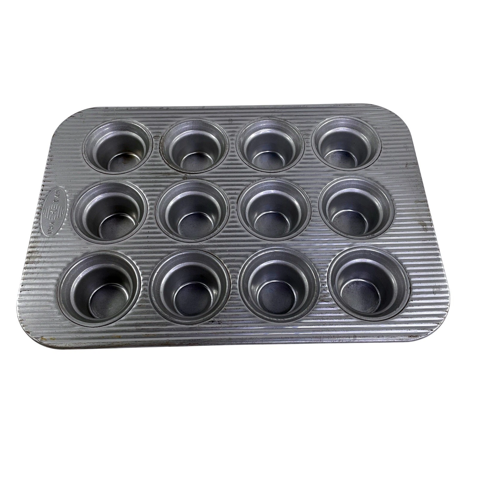 USA Pan Bakeware 12 Well Muffin Cupcake Pan Aluminized Steel Nonstick Silver
Opens in a new window o