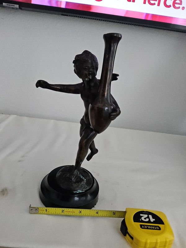Bronze Cherub Holding Vase On Black Marble Base