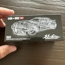 Mini GT x Kaido House 1:64 Nissan GT-R (R33) Active Carbon R - KHMG116