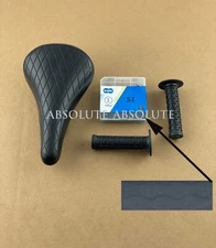 BLACK DIAMOND STITCHED BMX BIKE SADDLE W/ BMX KMC CHAIN &TRIANGLE STYLE GRIPS. 