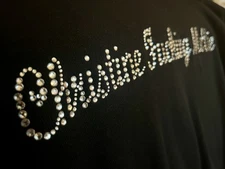 Black 'Christine F**king McVie" bedazzled top, owned by Christine McVie