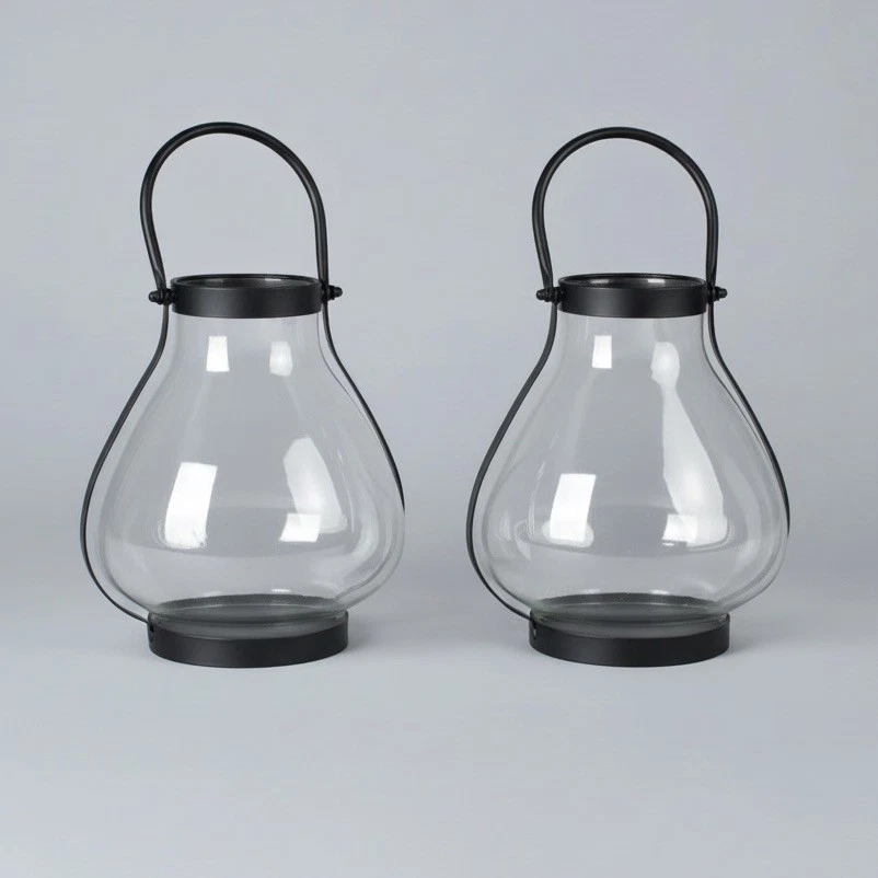Par de linternas de vidrio de metal negro portavelas lágrimas para interiores y exteriores FS Foto 4 de 4