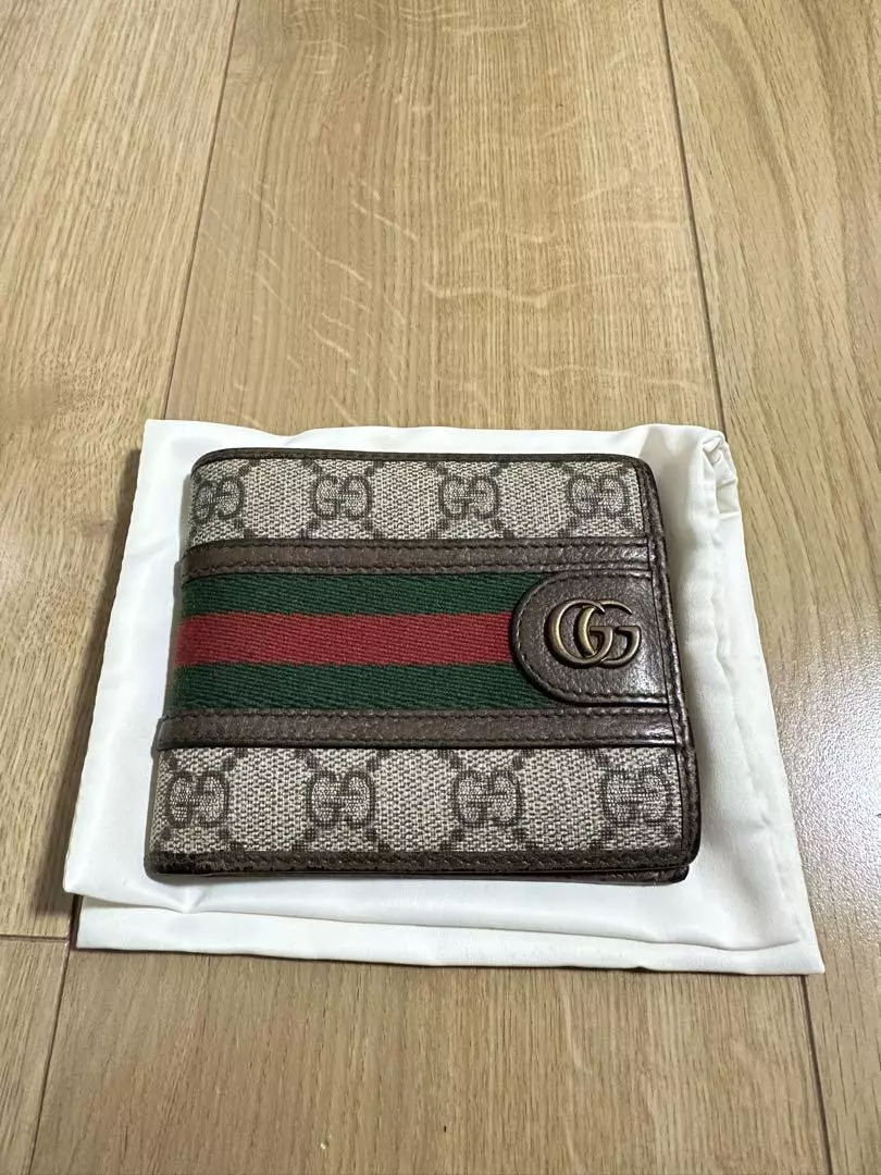 Gucci GG Supreme Portefeuille Bifold 597609 Marron Toile PVC Unisexe Occasion Avec Boîte
