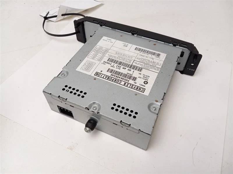 REPRODUCTOR DE CD DVD P/N P05064063AE se adapta a Chrysler Town Country 2007-2009 Foto 4 de 4