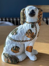 Antique, Staffordshire mantle dog with separate front leg