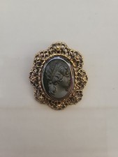Broche camafeo negro vintage con base de metal