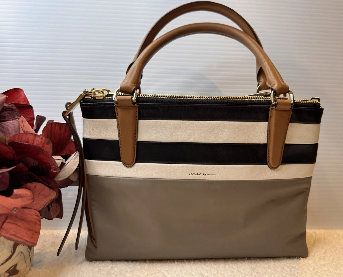 Preços baixos em Transversal Coach Borough Zip Bolsas e Sacolas