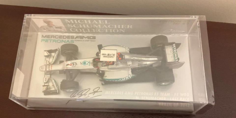 MINICHAMPS 1:43 MERCEDES W03 M. SCHUMACHER LAST RACE BRAZIL GP 2012 MSC#52 - Image 2 of 3