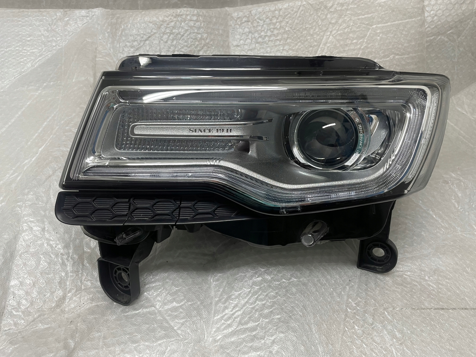 Frontscheinwerfer Jeep Cherokee 68111035AG Xenon Links 