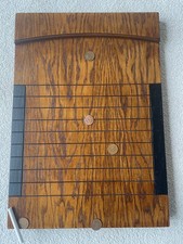 Shove half penny board with 5 old happenies .