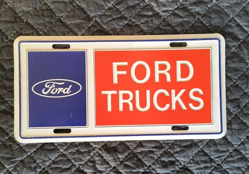 Vintage Embossed FORD TRUCKS Dealer Booster License Plate