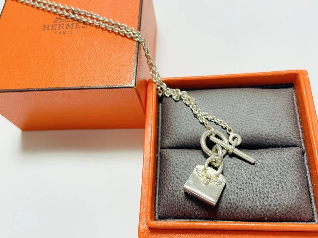 HERMÈS Collana Hermes Argento Birkin Charm Amuleto Ottimo Usato Senzala Scat