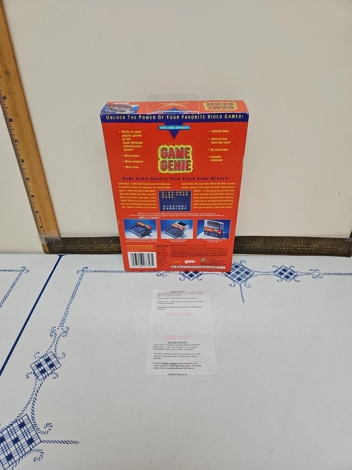 GAME GENIE 7353 1991/92 (NINTENDO SNES) Galoob FACTORY SEALED W/PURCHASE RECEIPT - Image 2 of 4