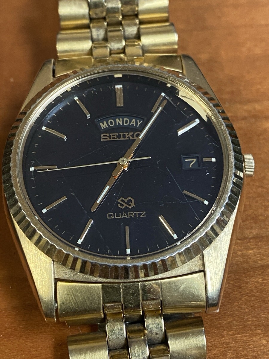 Vtg Seiko SQ Men 5Y23-8A69 36mm Gold Tone Black Dial DayDate