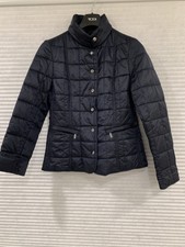Tumi Women’s Quilted Buttoned Jacket. Color Navy. Size Medium