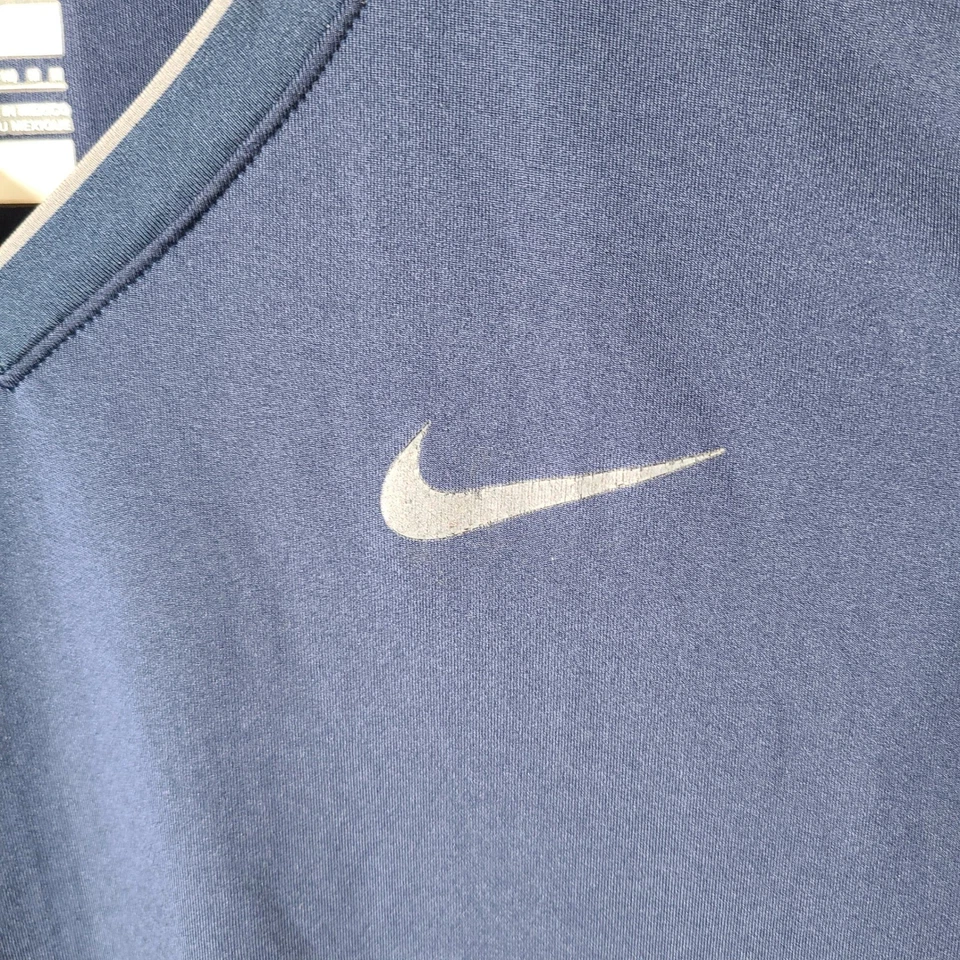 Camisa Nike Pro para mujer mediana azul ajustada cuello en V atlética elástica manga corta Foto 3 de 4