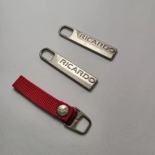 Ricardo Beverly Hills Two Suitcase Luggage Zipper Pulls and Red Nylon Expander