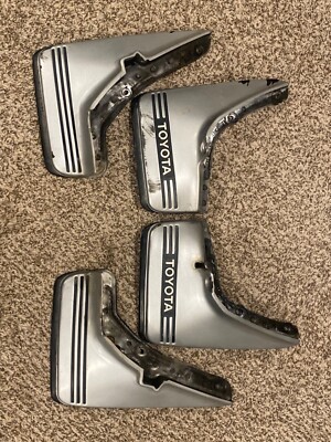 Toyota Cressida mud splash guards Super Silver MX73 OEM Genuine 85-88