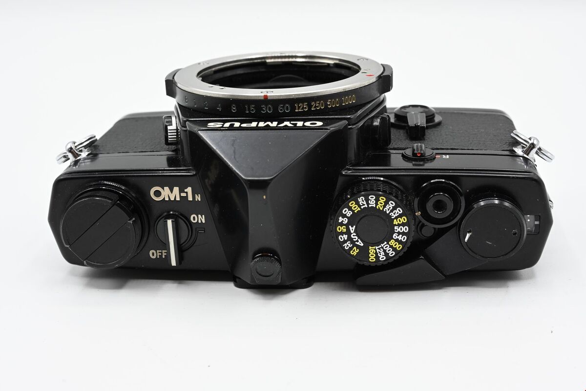 Olympus OM-1 OM-1n M-1 in Chrome or Black w/ optional 50mm f Olympus OM-1 OM-1n M-1 in Chrome or Black w/ optional 50mm f