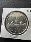 1960  Canada Elizabeth ll  ONE Dollar SILVER  "Voyageur" Coin