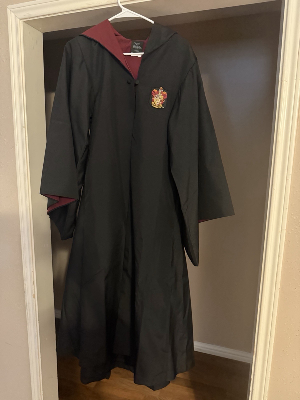 Bata con capucha Universal Studios Harry Potter Gryffindor XS negra/roja