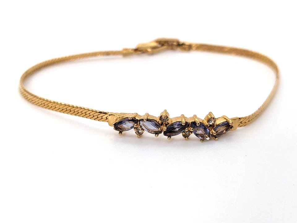 Pulsera Avon imitación tanzanita tono oro Foto 2 de 4