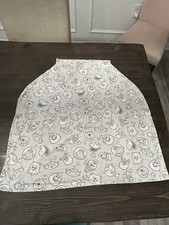 Snob Milk Snob 5-in-1 baby cover with iconic Disney Pixar characters.