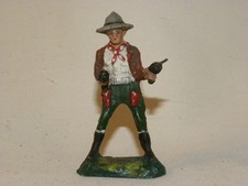 FIGURINE EN COMPOSITION DURSO COWBOY TIRANT AVEC 2 REVOLVERS  CHIALU ELASTOLIN