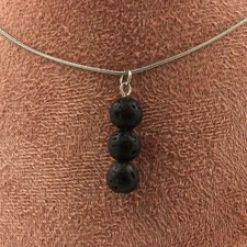 stones And Minerals. Necklace 3 Lava Beads 8 Mm. Stainless Steel Chain.