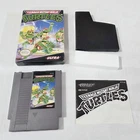 T-150 VINTAGE NINTENDO NES TEENAGE MUTANT NINJA TURTLES WORKING W/ ORIGINAL BOX