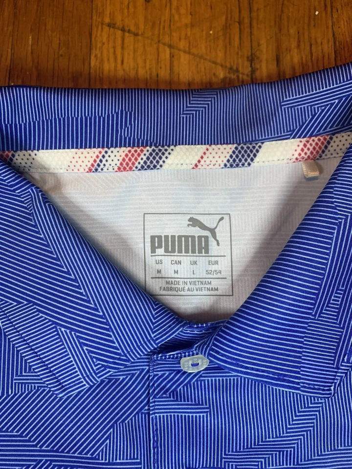 Camisa polo de golf Puma Volition America Wings con logotipo integral para hombre mediana a rayas azules Foto 4 de 4