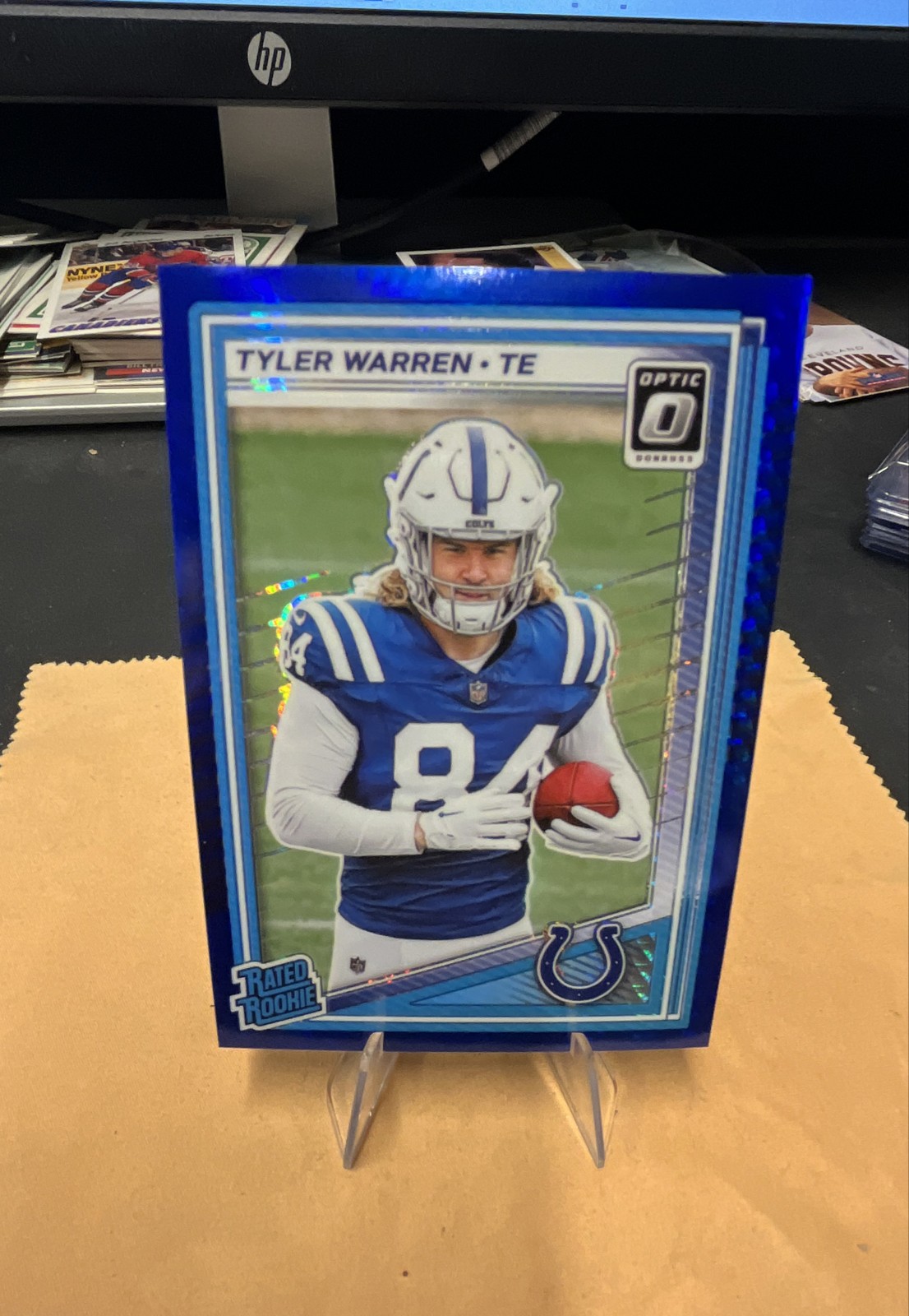 2025 Panini Donruss Optic - Rated Rookie Tyler Warren #234 Blue Hyper Prizm (RC)