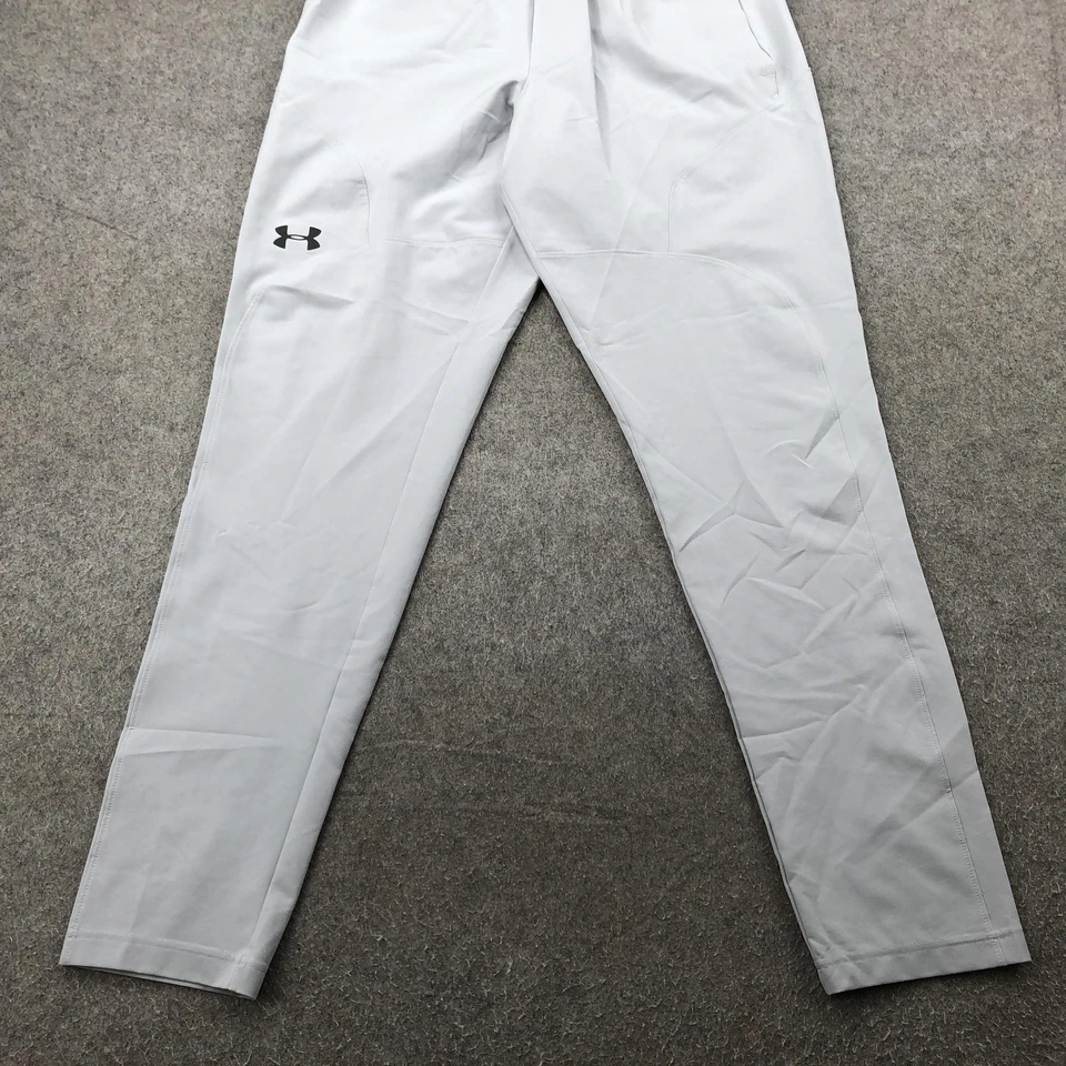Pantalones de chándal Under Armour Storm para hombre gris medio repelente al agua ajustados con cremallera Foto 2 de 4