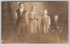 RPPC Four Lovely Sisters Primitive Dresses Sweet Faces and Smiles Postcard C21